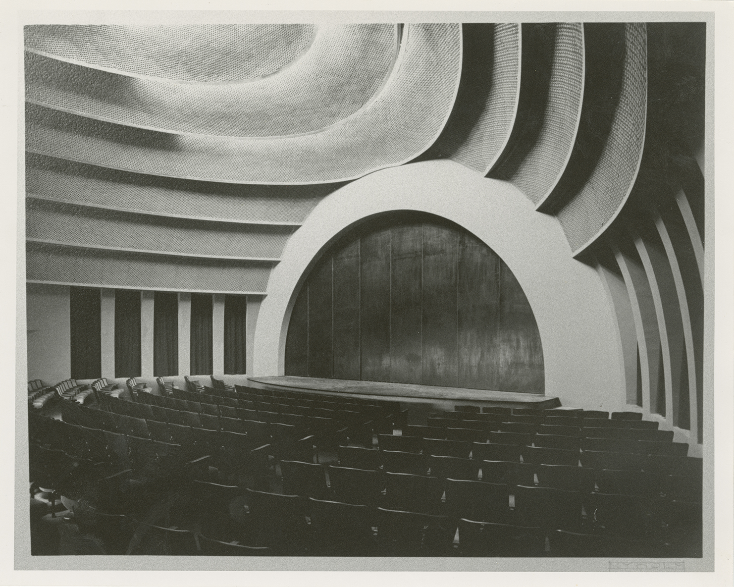 Auditorium of the New School. Grey-scale photo with striking geometrical patterns. 